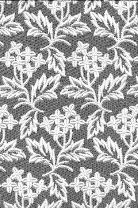 macrame ricamato biano Foto 1