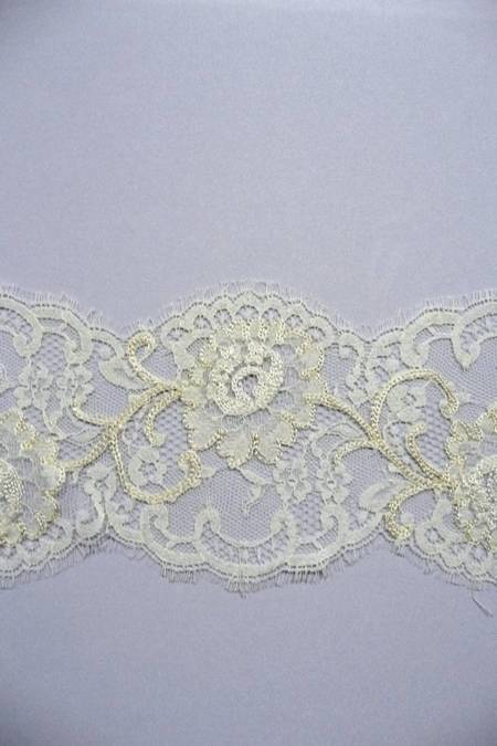 pizzo rebrode avorio soutache Foto 1