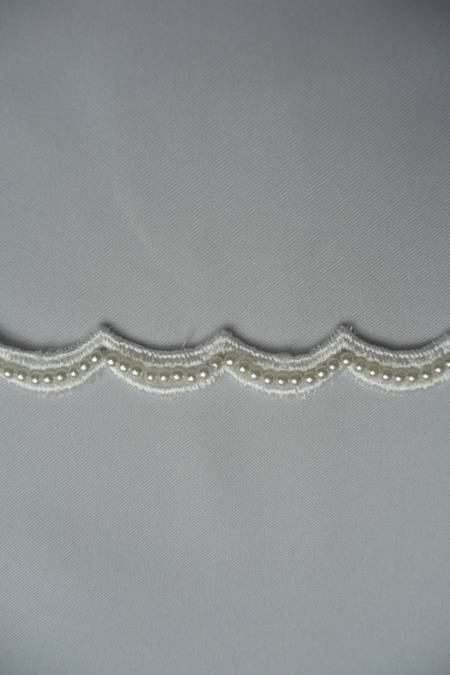 macrame bianco perle Foto 1