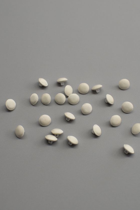 Bottoni foderati mm 10 nei colori bianco avorio seta